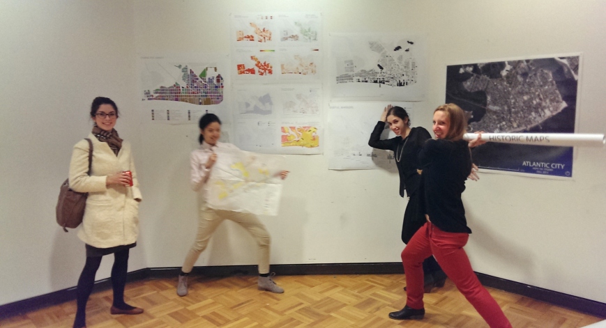 Some of my studio members with GIS maps of the city's demographics.